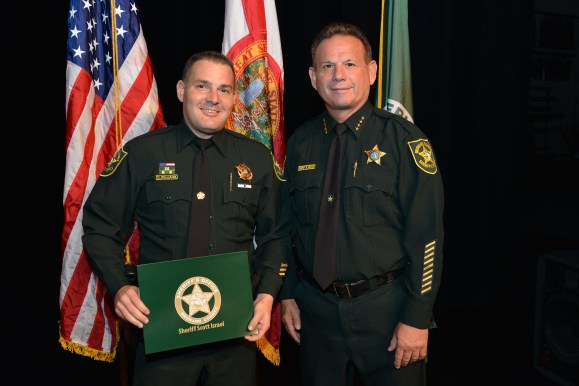 Detective Chris Williams w Sheriff Isreal